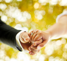 Couple holding hands